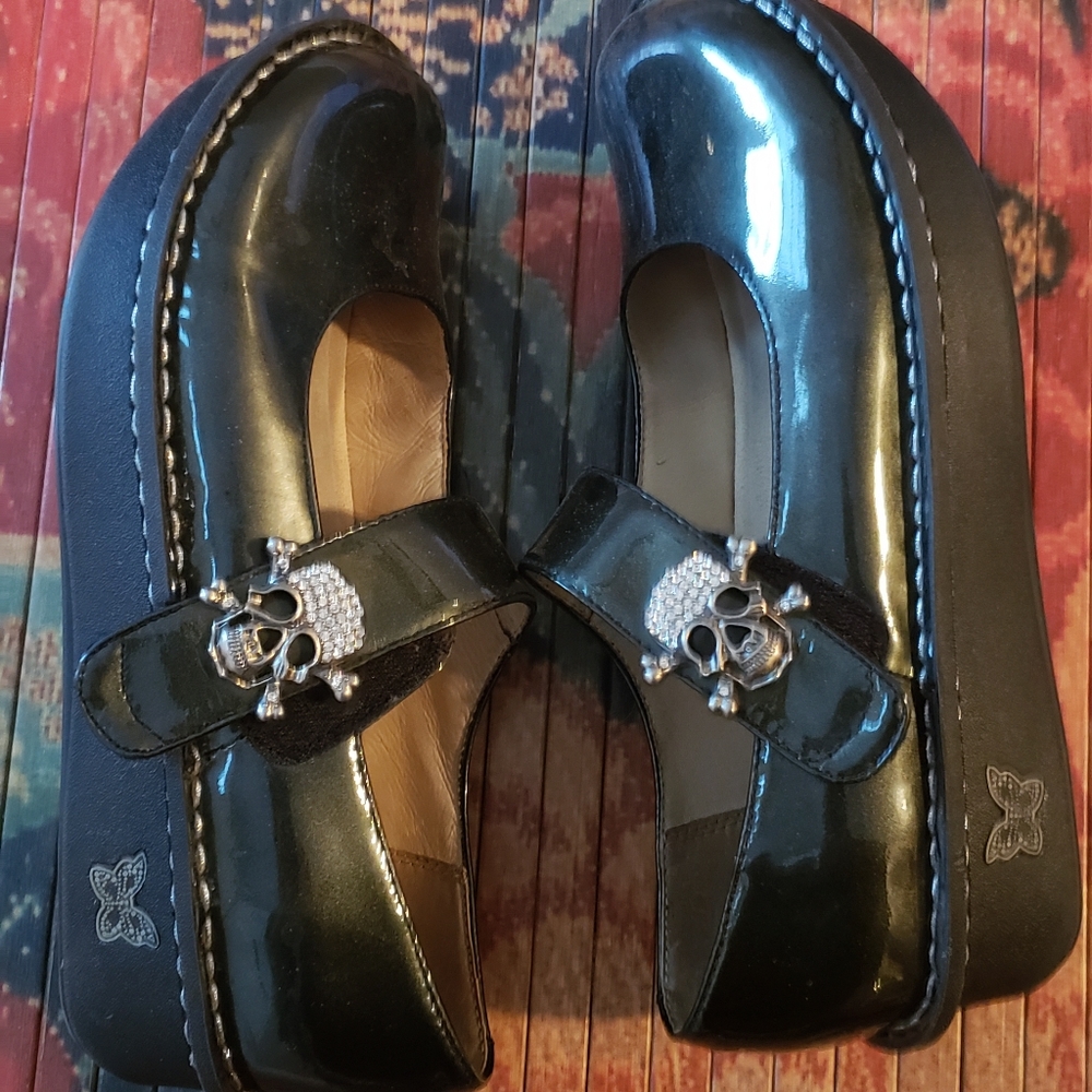 Alegria Dark Green Glossy Mary Jane’s with Skull Accent